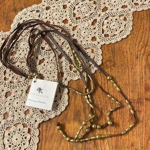 Leather and metal layered noonday necklace